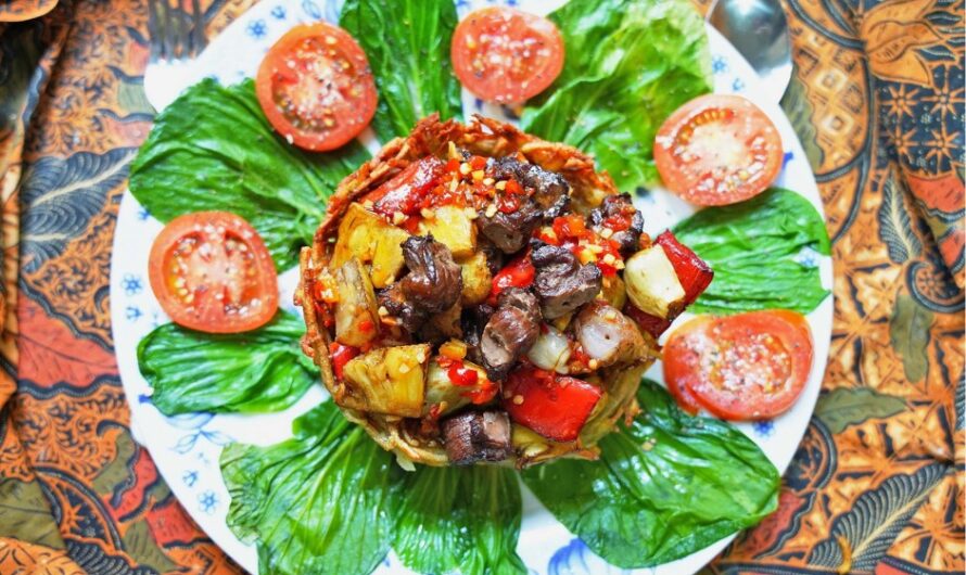 Colorful pork in a potato nest