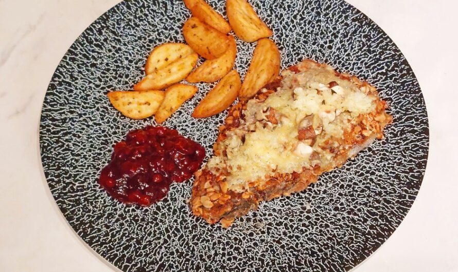 Pork schnitzel with mountain cheese and mushrooms