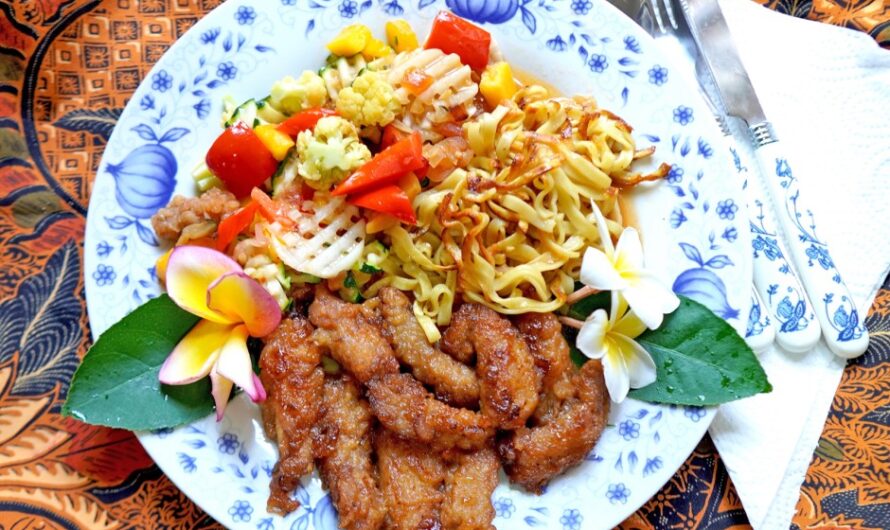 Deep-fried pork with Cap Cay and fried noodles.