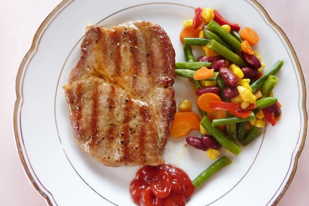 Grilled pork steaks