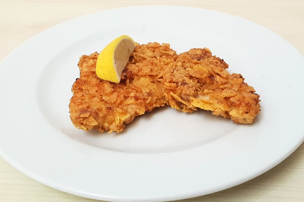 Breaded schnitzel with tortilla chip crust.